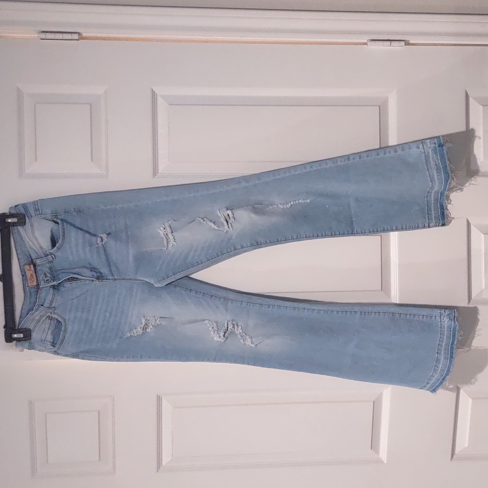 Elite Jeans high rise distressed flared leg jean. Stretchy material size 11/30